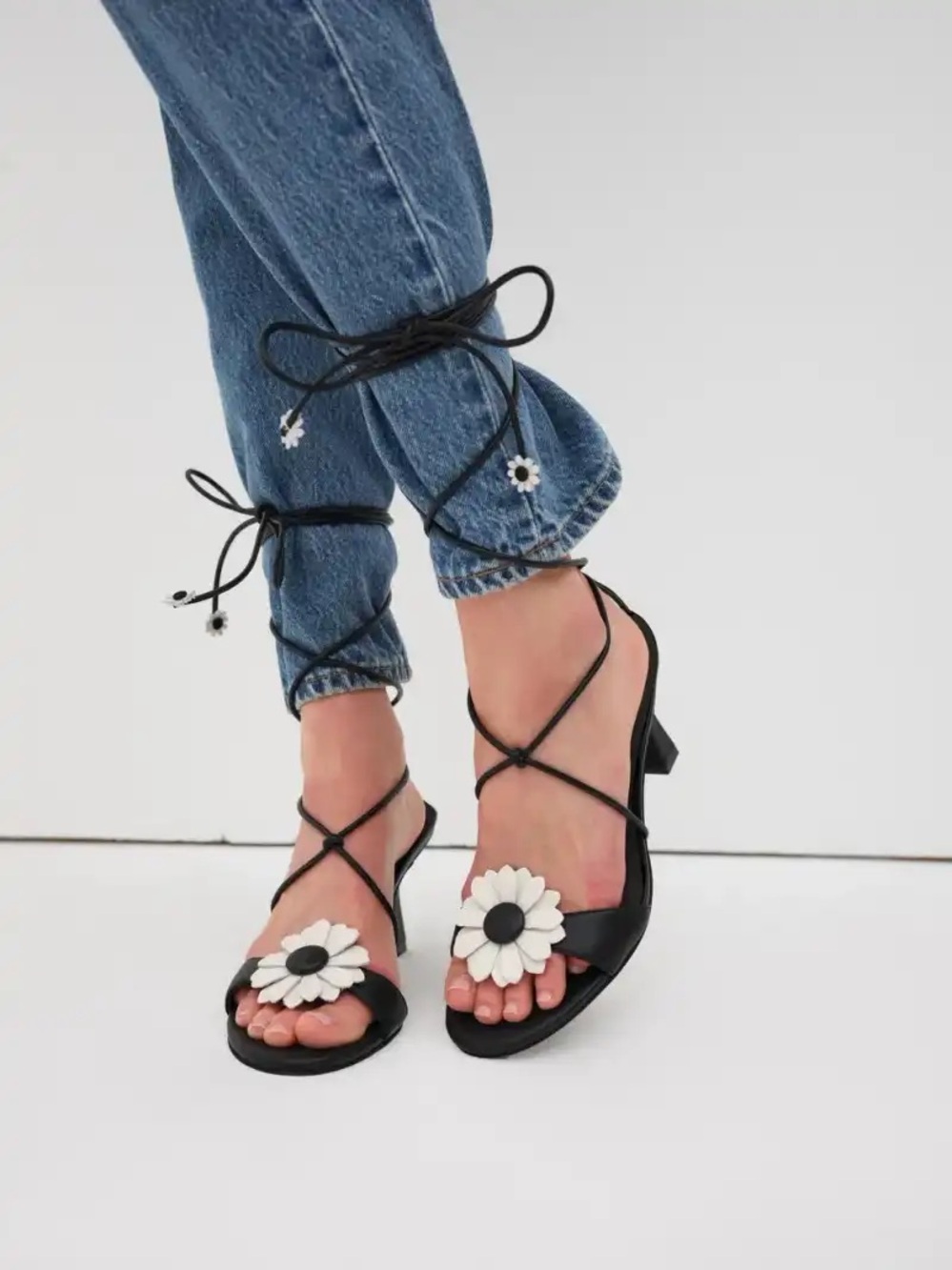 For Love & Lemons x Dolce Vita Black Lace-Up Heels White Daisy Accent Sandals